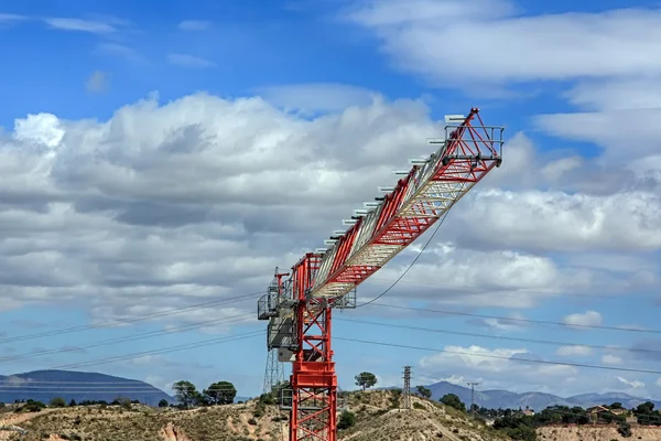 Crane modern white and red with sky and clouds behind — Stock Photo, Image