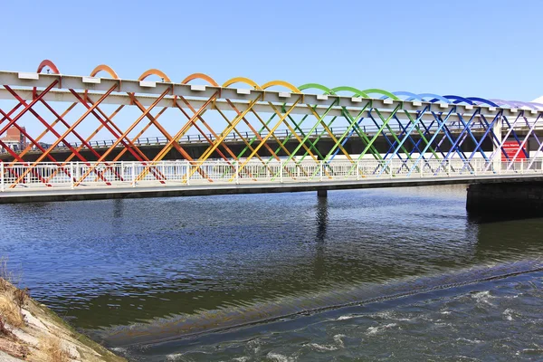 Modern bridge of iron, painted colors — Stock Photo, Image