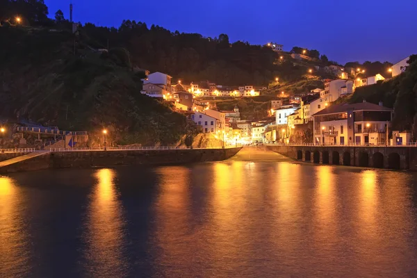 Night entrance from the sea to the fishing village of cudillero — Stock Photo, Image