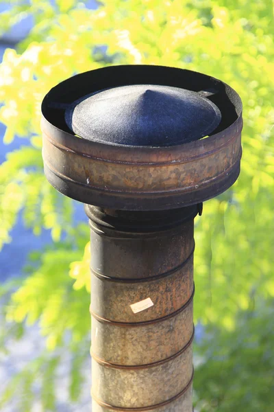 Small metal chimney on a roof — Stock Photo, Image