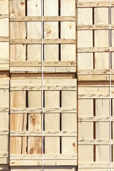 Achtergrond met houten kisten — Stockfoto