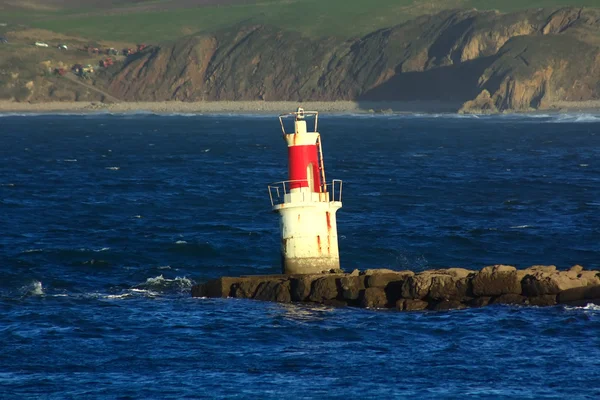 Breakwater with lighthouse — Stock Photo, Image