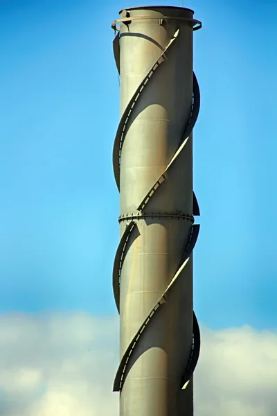 Chimneys of a petroleum refinery — Stock Photo, Image