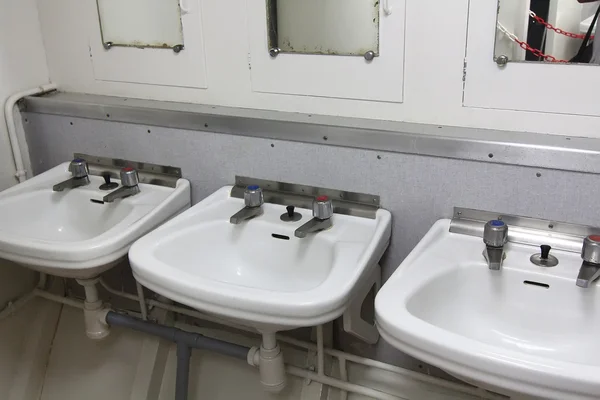 Basins in the interior of a small boat — Stock Photo, Image