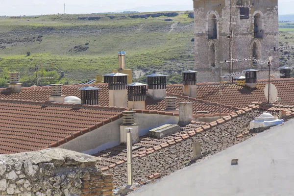 Chimneys on the roofs of a village — Stock Photo, Image
