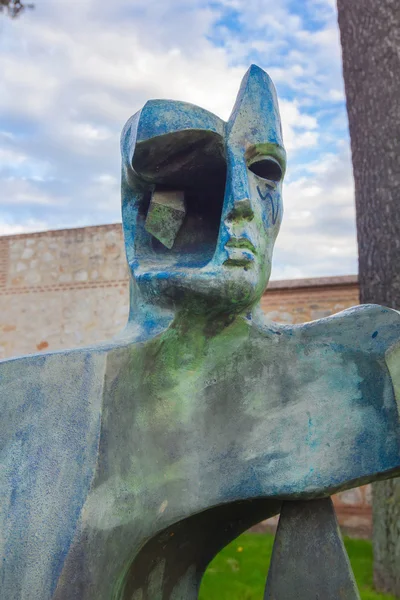 Modern abstract bronze sculpture of a person — Stock Photo, Image