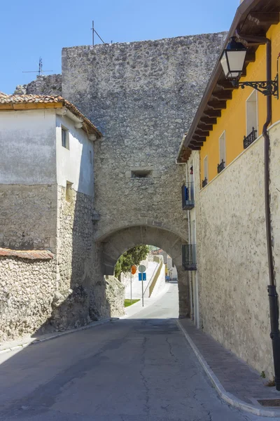 Old stone wall and entrance to the Mudejar era, the village of C — Stock Photo, Image