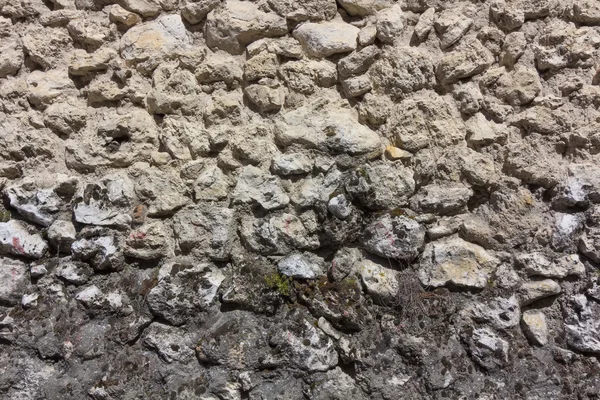 Wand aus kleinen Steinen — Stockfoto