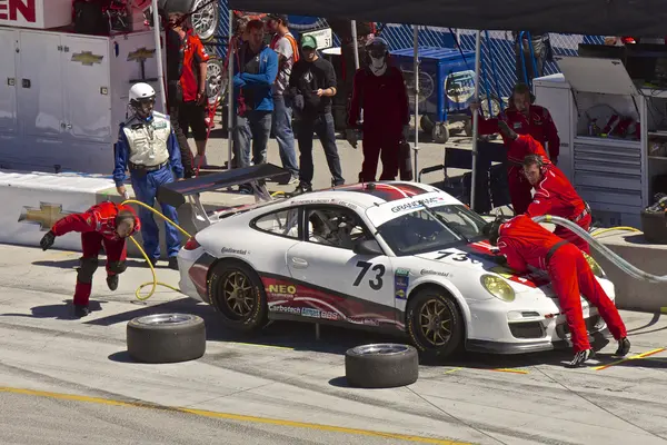 Porsche GT2 iin pit stop at Grand AM Rolex Races on Mazda Laguna Seca Raceway — Stock Photo, Image