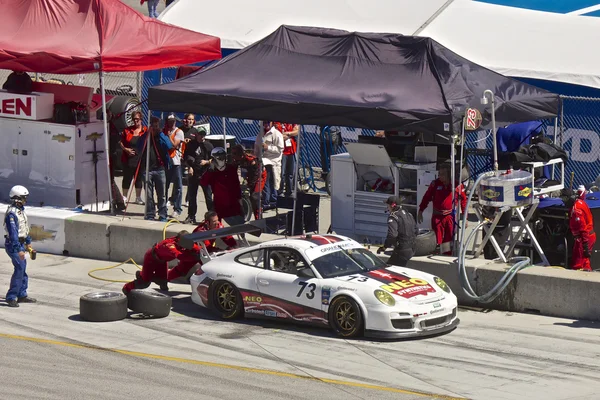 Porsche gt2 VV v boxech v grand am rolex závody na mazda laguna seca raceway — Stock fotografie