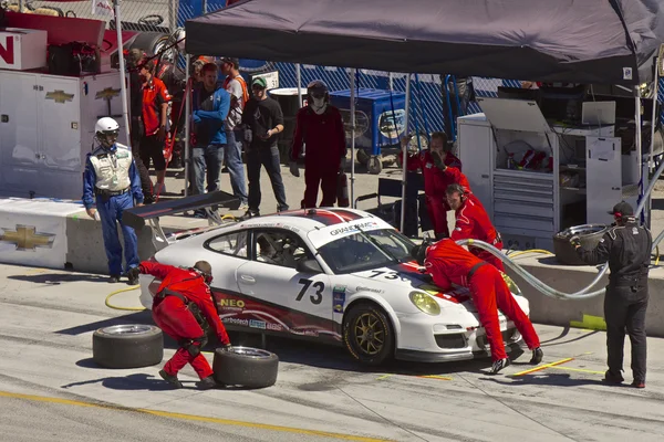 Porsche GT2 iin pit stop at Grand AM Rolex Races on Mazda Laguna Seca Raceway — Stock Photo, Image