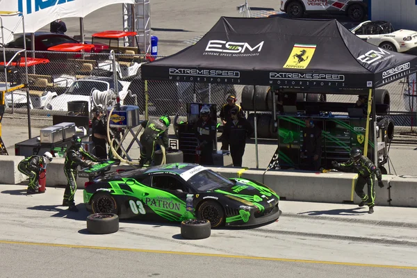 Ferrari F458 in pit stop at Grand AM Rolex Races on Mazda Laguna Seca Raceway — Stock Photo, Image