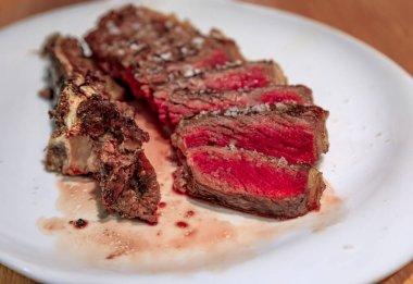 Chuleton, traditional Spanish rib eye steak in a restaurant in Pamplona, Spain clipart