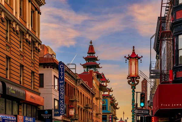 stock image Traditional shops, lanterns and a pagoda in San Francisco Chinatown at sunset