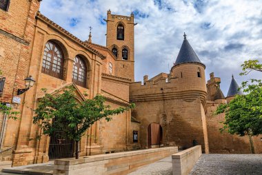 Olite, Spain - June 23, 2021: Details of the ornate gothic architecture of the palace of the Kings of Navarre or Royal Palace of Olite in Navarra