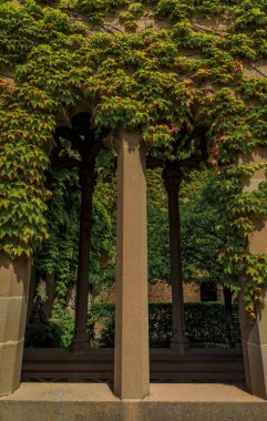 Olite, Spain - June 23, 2021: Details of the ornate gothic arcade columns at the palace of the Kings of Navarre or Royal Palace of Olite in Navarra