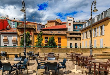 Tables at one of many outdoor cafes in Casco Viejo, the historic Old Town Pamplona, Spain famous for running of the bulls