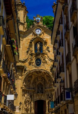 San Sebastian, Spain - June 26 2021: Basilica of Saint Mary of the Angelic Choir, 18th century Catholic church with ornately carved exterior doors