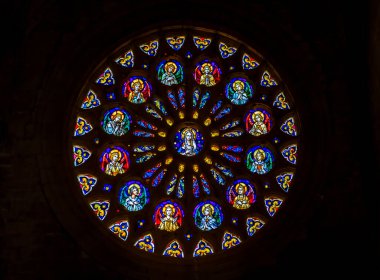 San Sebastian, Spain - June 26, 2021: Stained glass rose window in the 16th century San Bizente Eliza or San Vicente Martyr Gothic style church