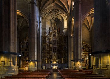San Sebastian, Spain - June 26 2021: Elaborate gold altar in the 16th century San Bizente Eliza or San Vicente the Martyr Iglesia church
