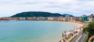 Panoramic view of La Concha bay and beach in San Sebastian Donostia with the city coastline and waterfront houses in the Basque Country, Spain