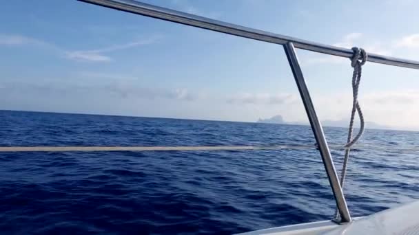 Boat sailing in blue mediterranean sea on ibiza islands — Stock Video