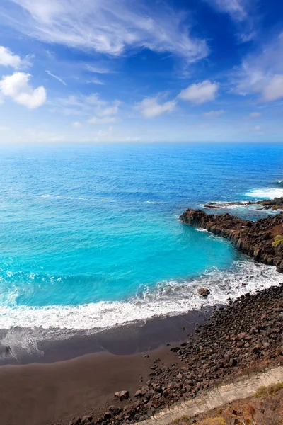 Strand el bollullo zwart bruin zand en aqua water — Stockfoto