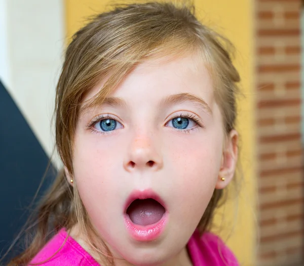 Blond girl with surprised gesture face portrait — Stock Photo, Image