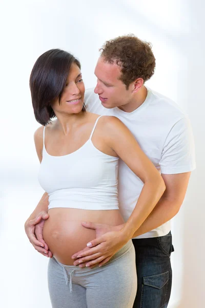 Beautiful pregnant woman with husband couple — Stock Photo, Image