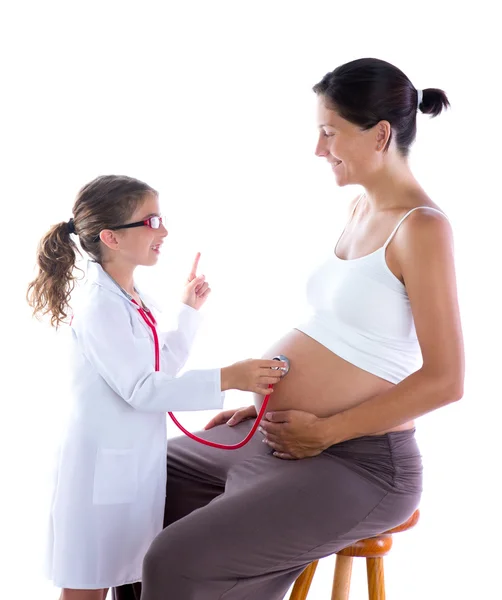 Beautiful pregnant womanand kid girl as stethoscope doctor — Stok fotoğraf