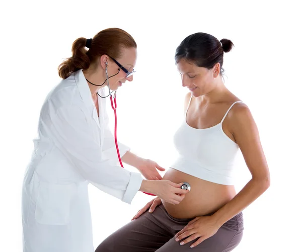 Beautiful pregnant woman with doctor and stethoscope Stock Photo