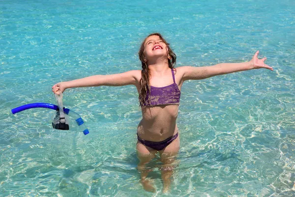 Aqua water beach and open arms bikini little girl — стоковое фото