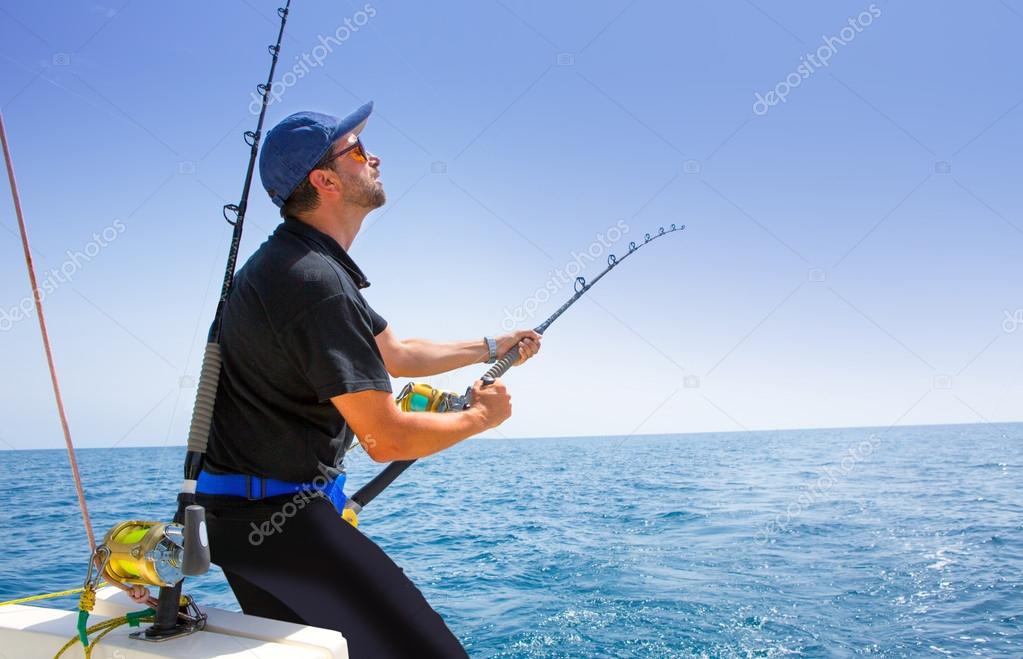 Blue sea offshore fishing boat with fisherman — Stock Photo