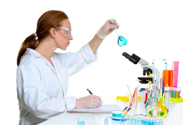 Chemical laboratory scientist woman with glass flask Stock Image