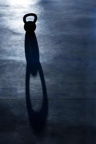 Crossfit Kettlebell weight backlight and shadow — Stock Photo, Image