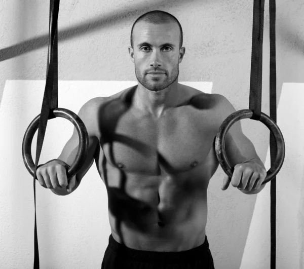 Crossfit dip ring man relaxed after workout at gym — Stock fotografie