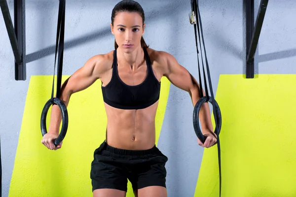Crossfit dip ring woman workout at gym dipping — Stock Photo, Image