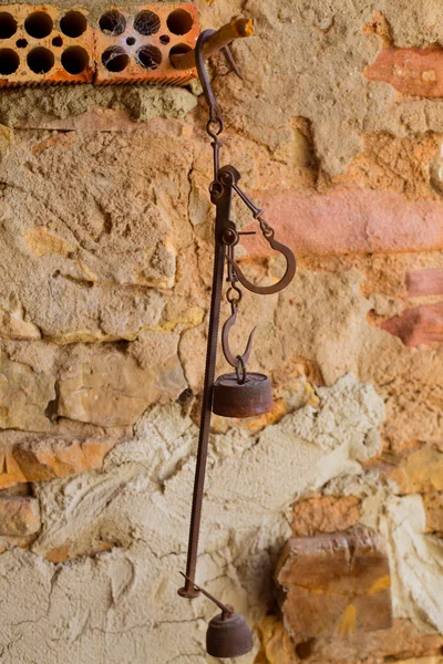 Antique scales rusted iron with weights — Stock Photo, Image