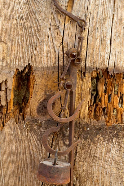 Antique scales rusted iron with weights — Stock Photo, Image