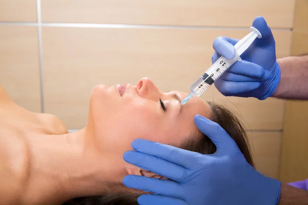 Anti aging facial mesotherapy syringe on woman face — Stock Photo, Image