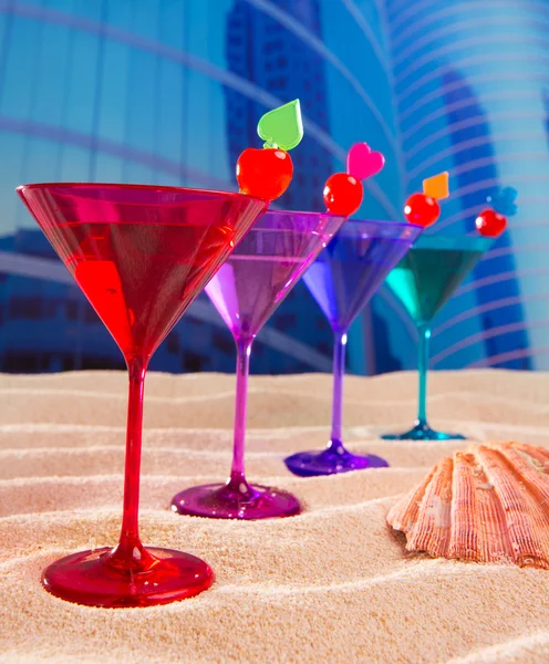 Colorful cocktail in a row with cherry sand in urban city — Stock Photo, Image