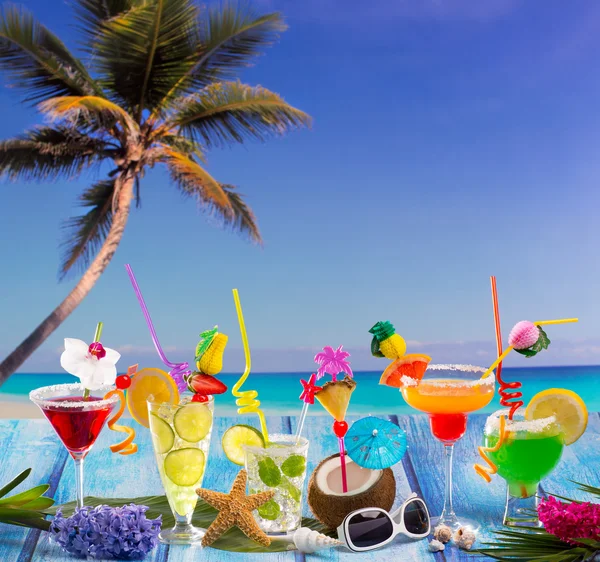 Colorful many tropical Cocktails in tropical blue wood — Stock Photo, Image