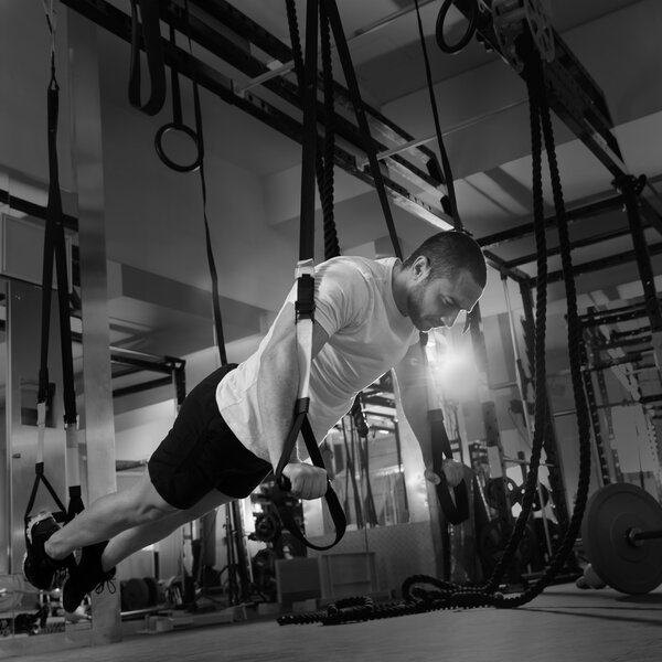 Crossfit fitness TRX push ups man workout