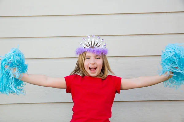 Blond kid girl playing like cheerleading pom poms and crown — Stock Photo, Image