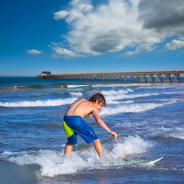 Boy surfer surfing waves on the Newport beach — Stock Photo, Image