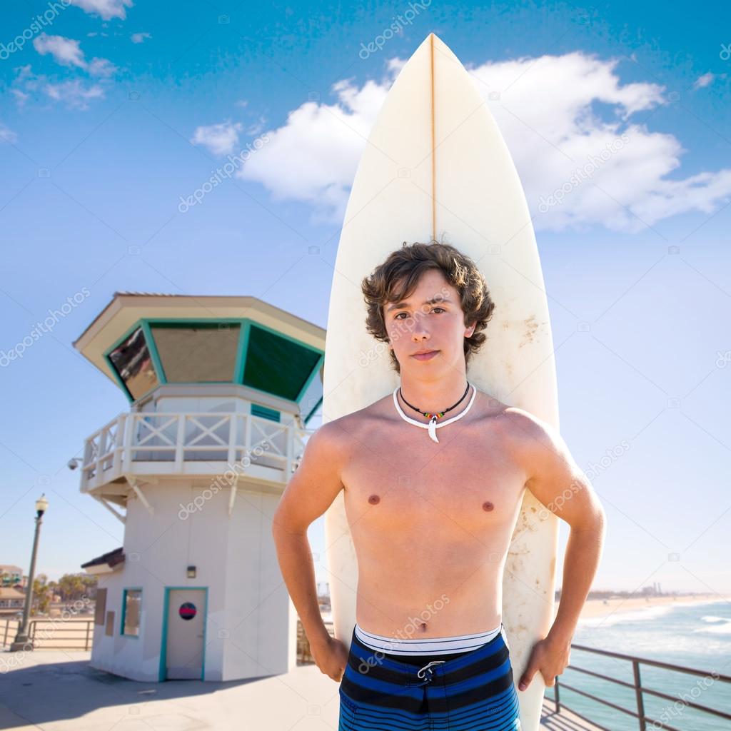 Surfer boy teen with surfboard in Huntington beach — Stock Photo ...