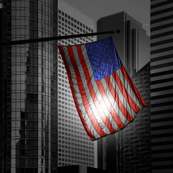US american symbol flag over Black and white modern LA — Stock Photo, Image
