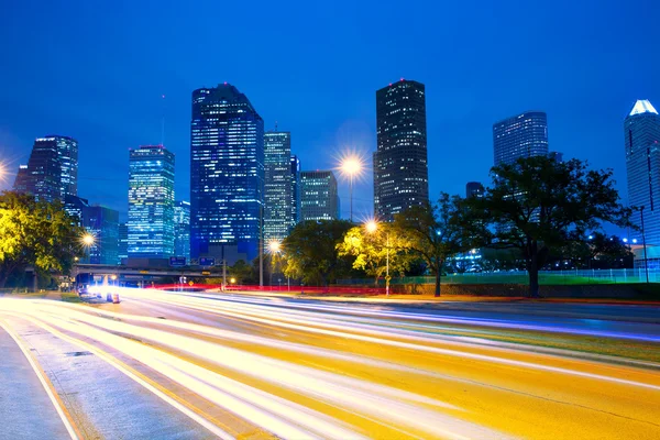 Houston Texas skyline at sunset with traffic lights — Stock Photo, Image
