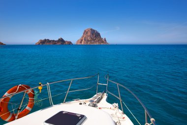 Boating in Ibiza with Es Vedra y Vedranell islands clipart