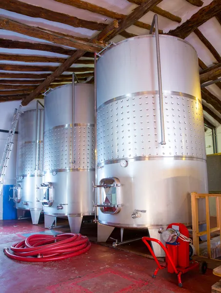 Stainless steel fermentation tanks vessels in winery — Stock Photo, Image